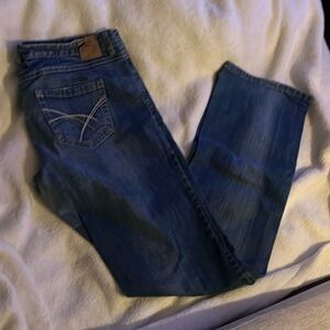 Woman’s comfy blue jeans. Wear with boots. Perfect for bonfires. Cute.
